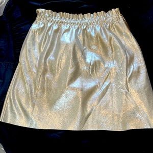 ZARA knit mini metallic gold skirt. Elastic waitline 28". Knit pockets, large.